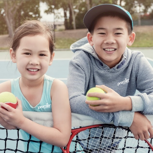 Kids smiling at the net